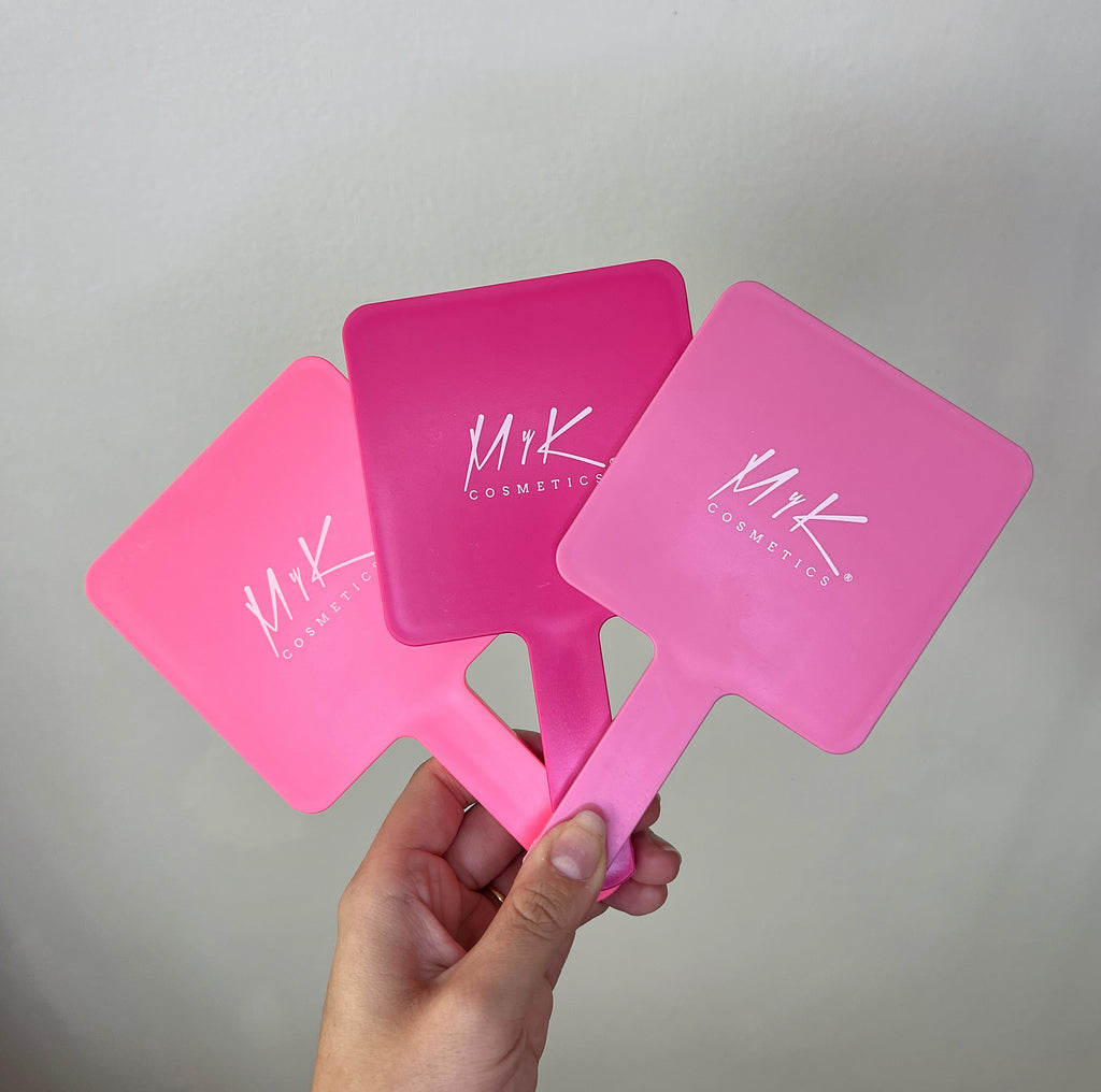 Espejitos de mano rosados