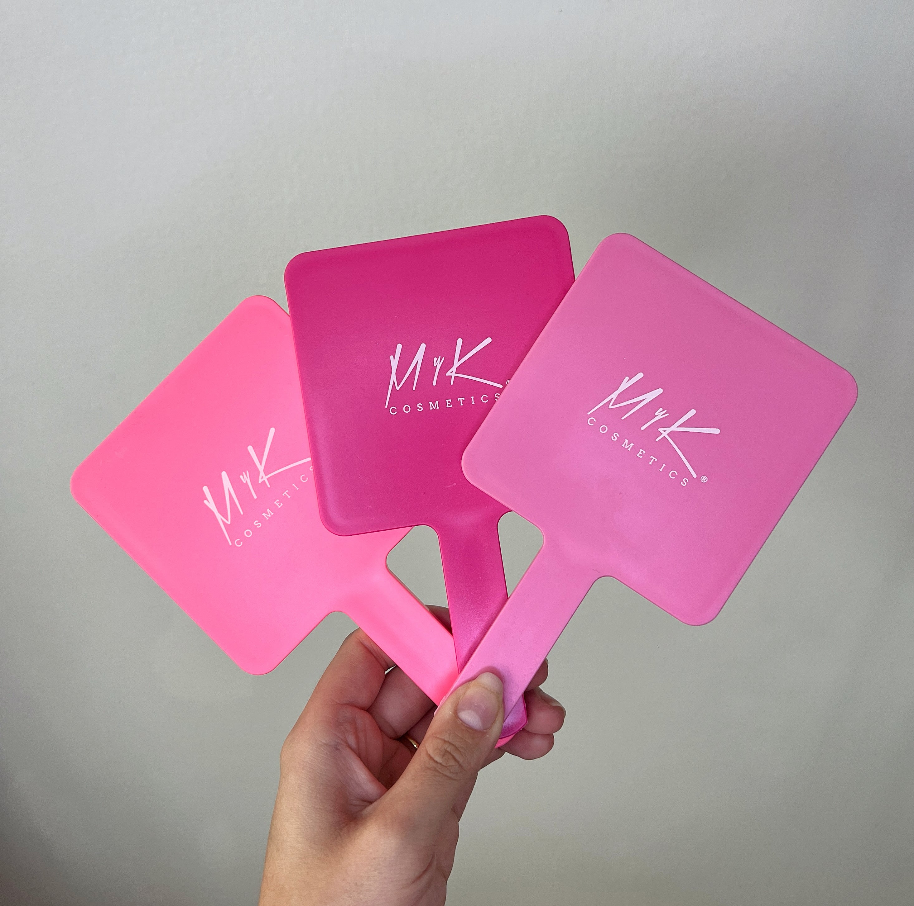 Espejitos de mano rosados