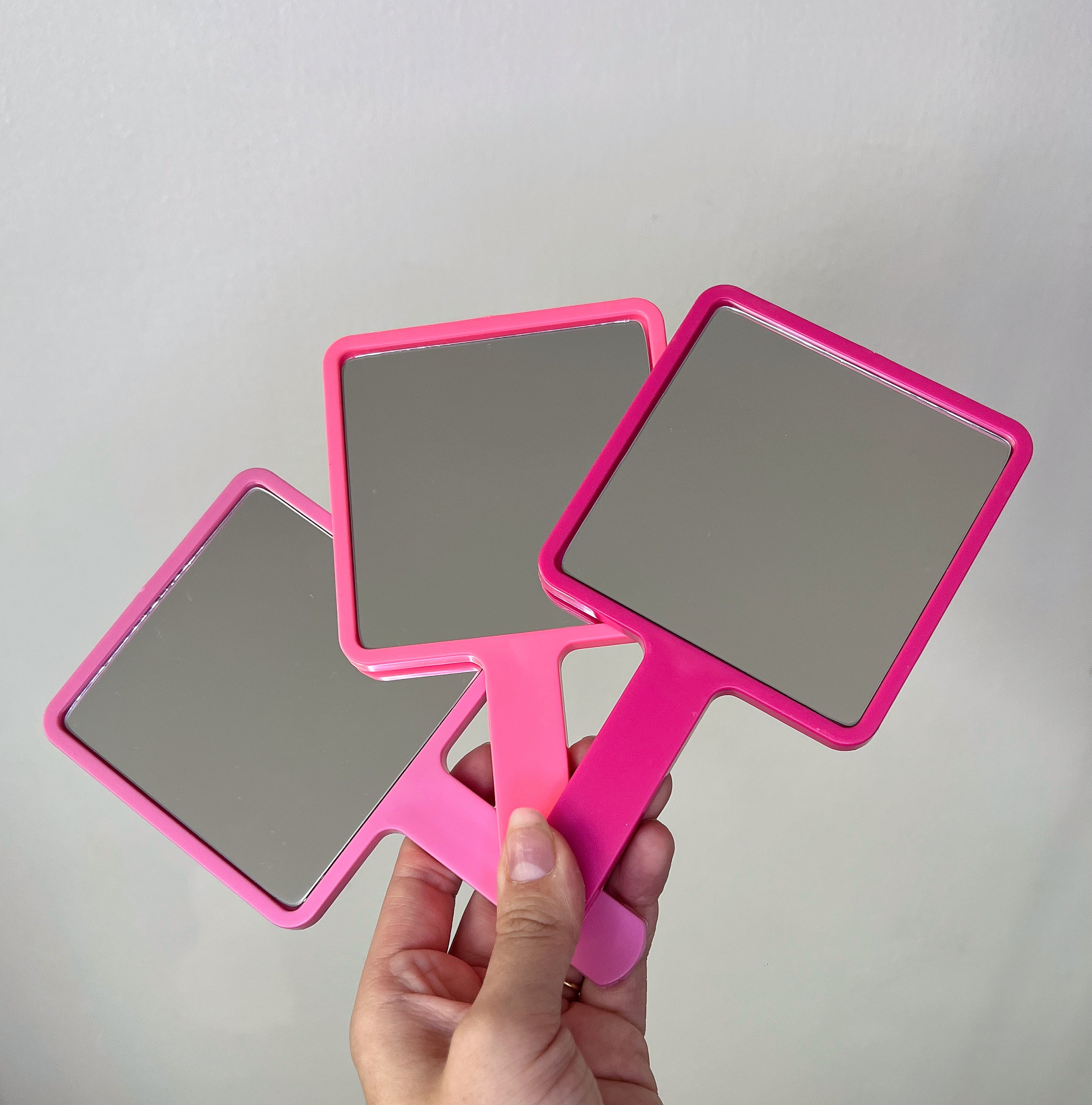 Espejitos de mano rosados